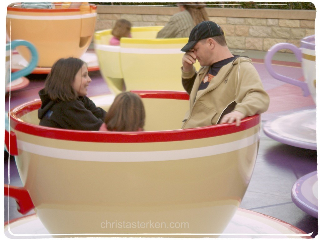 a sick daddy on the teacup ride