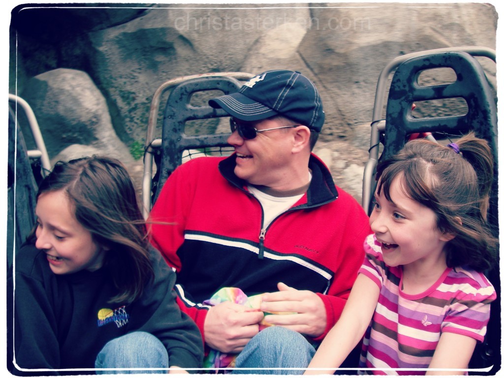 family on a whirling water ride