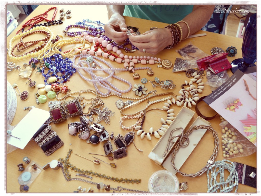 table full of costume vintage jewelry