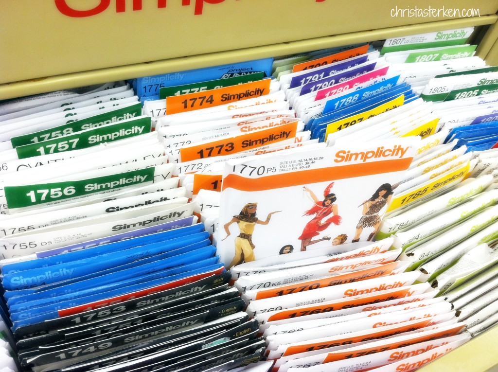 browsing drawer full of Simplicity patterns at fabric store