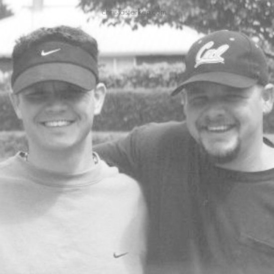 2 brothers wearing hats smiling