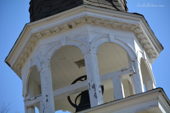 historic church steeple with bell