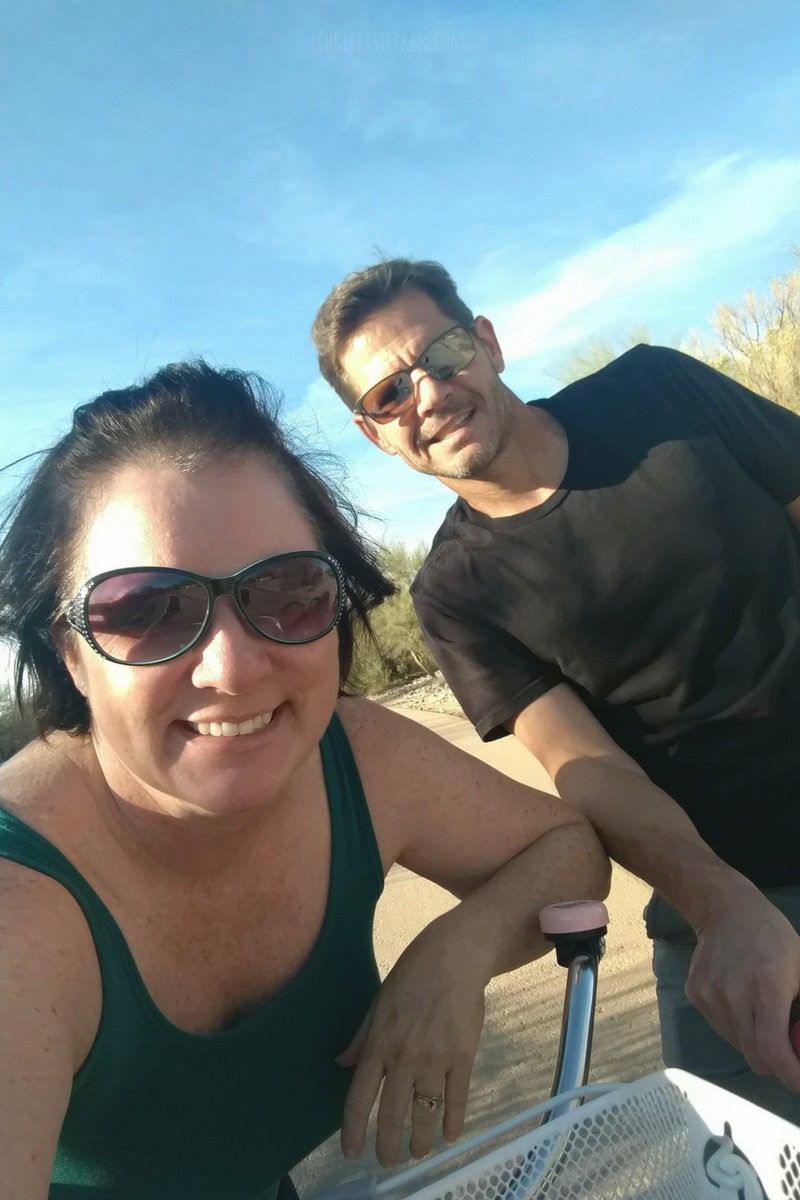 happy couple riding bikes