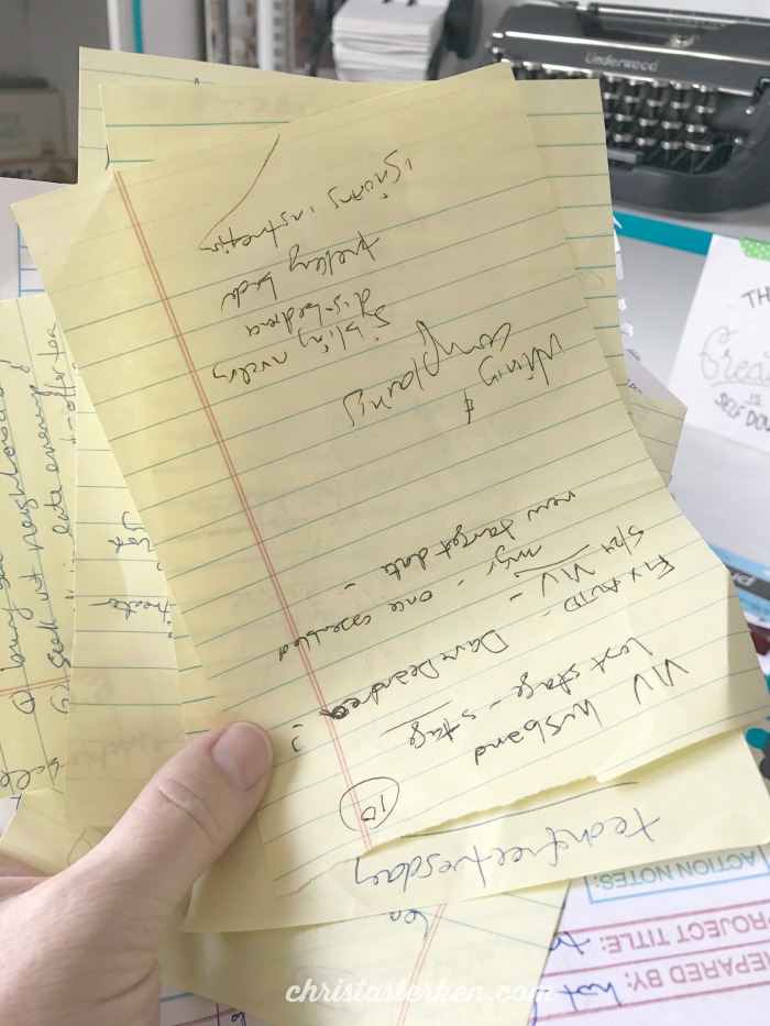 cluttered notes on desk
