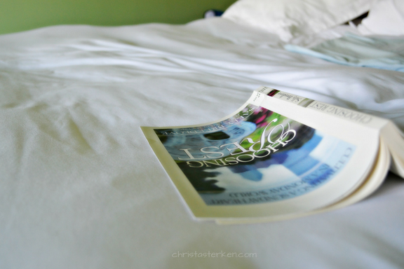 open book on bed