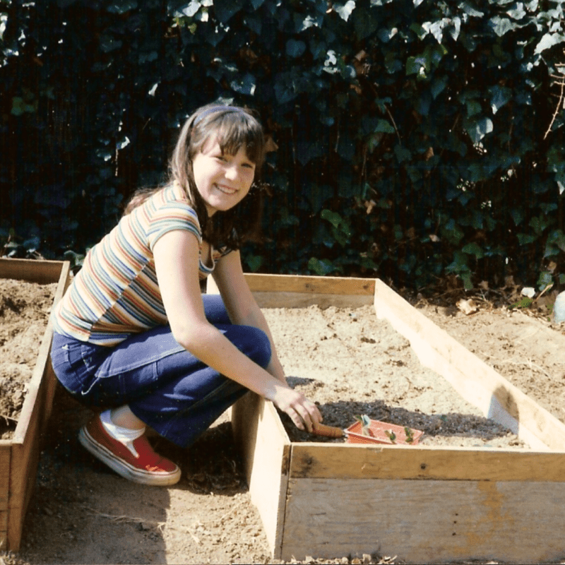 little girl gardening