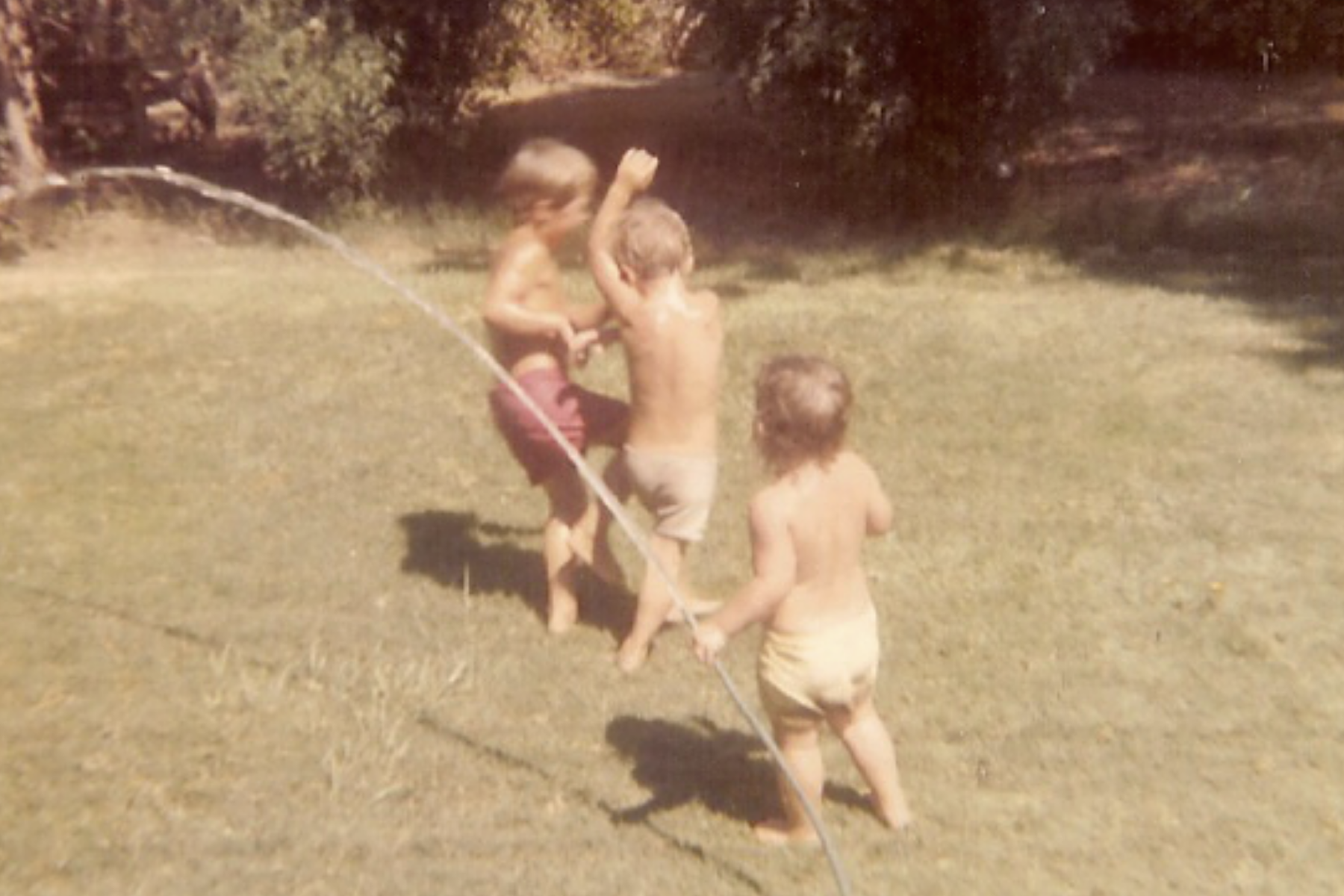  kids sprinkler 70's style