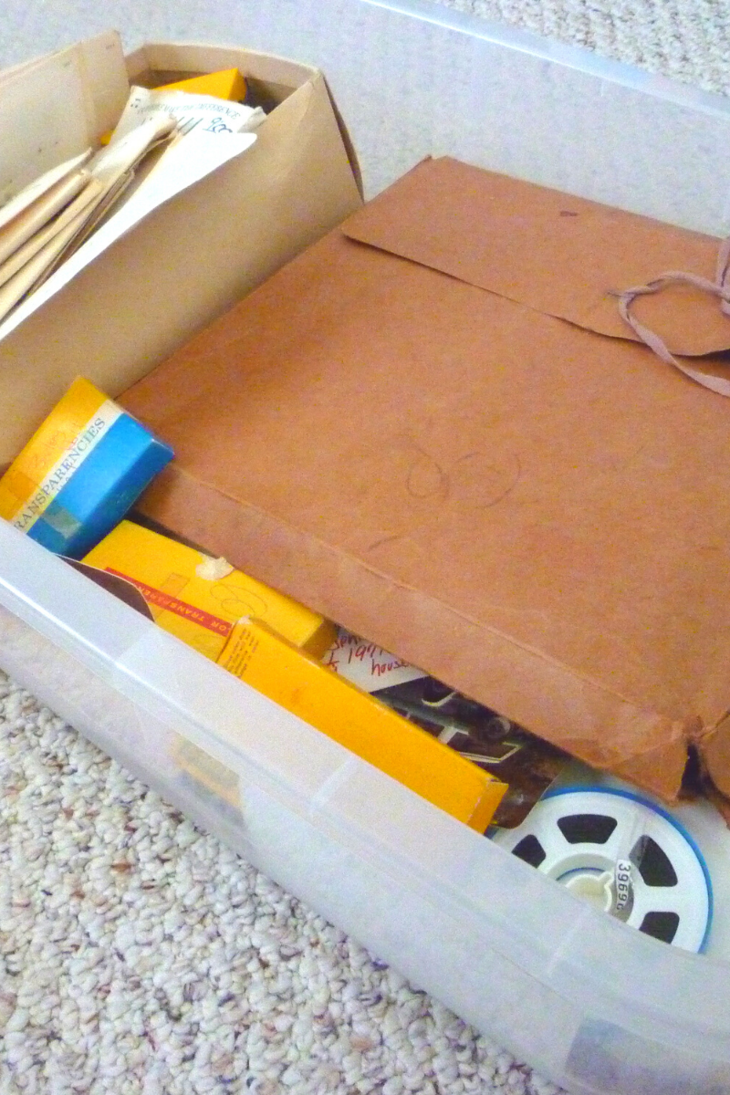 box of vintage film and photos