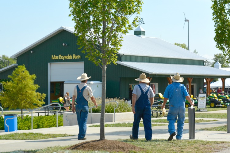 farmers walking towards barn