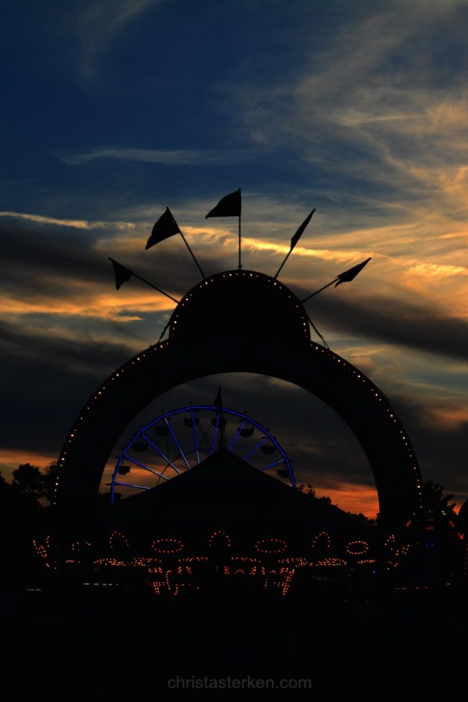 sunset over midway at state fair