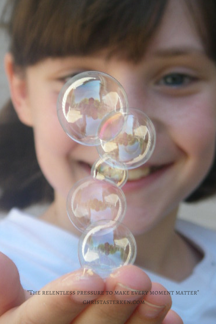 little girl with bubbles