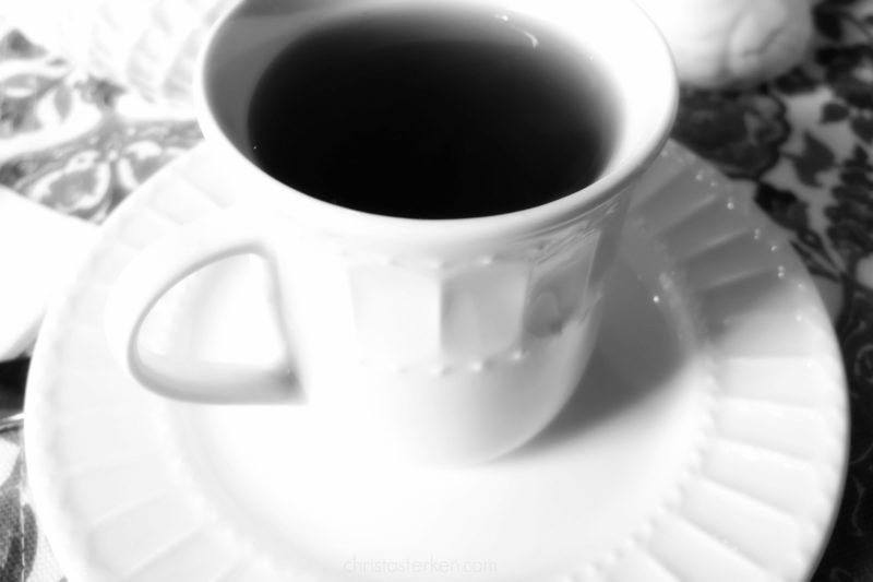 hospitality a black and white teacup