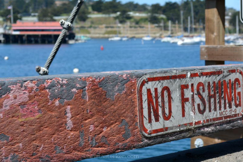 no fishing sign on pier in monterey