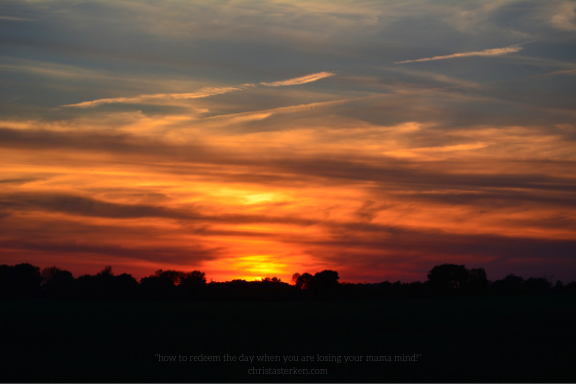 deep orange sunset over countryside