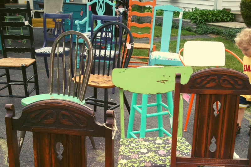 grouping of colorful chairs at sale