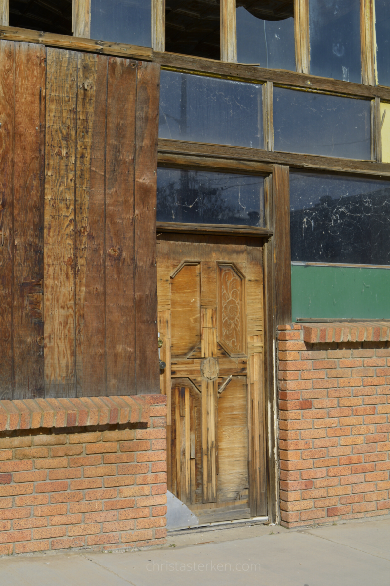 wooden door in abandoned building