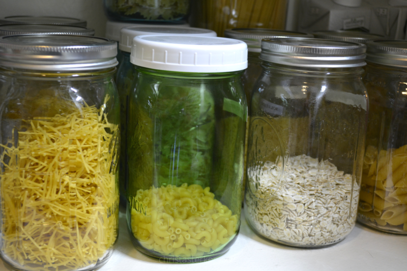 organized mason jars in pantry