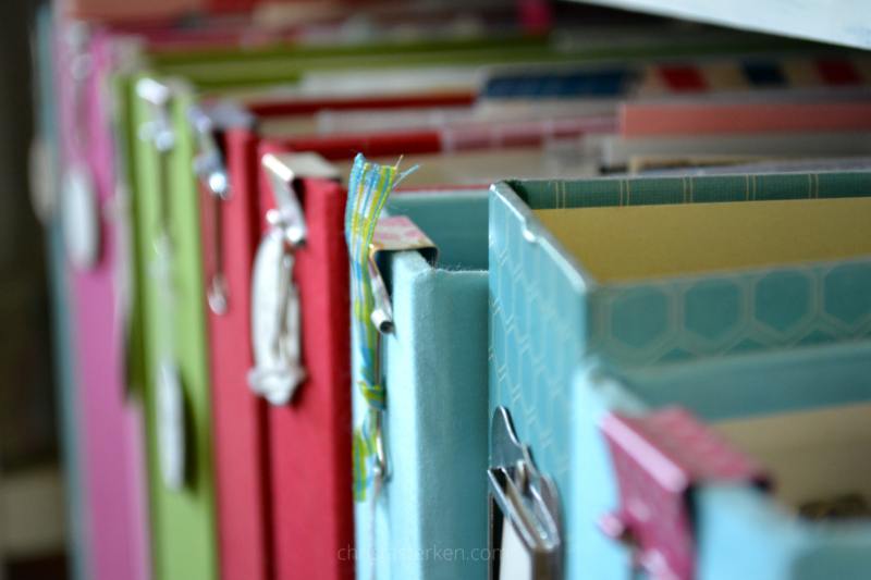 shelf full of scrapbooks