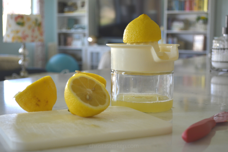 squeezing fresh lemon juice