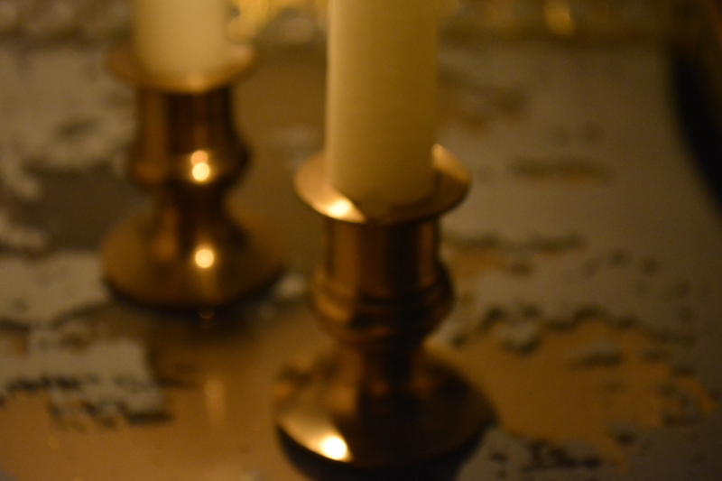 gold candlesticks glowing