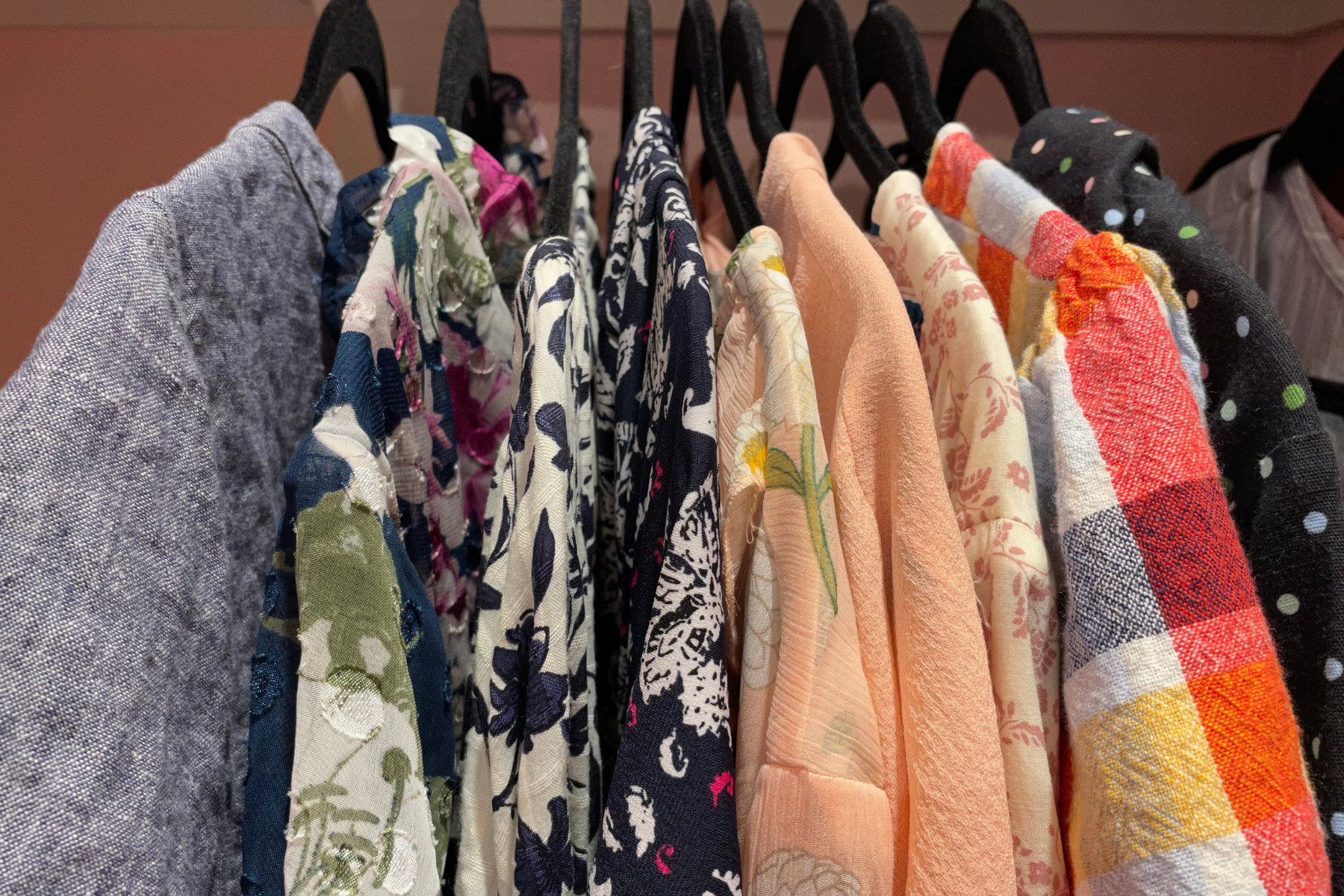 Curated capsule wardrobe with simple stylish dresses and basics